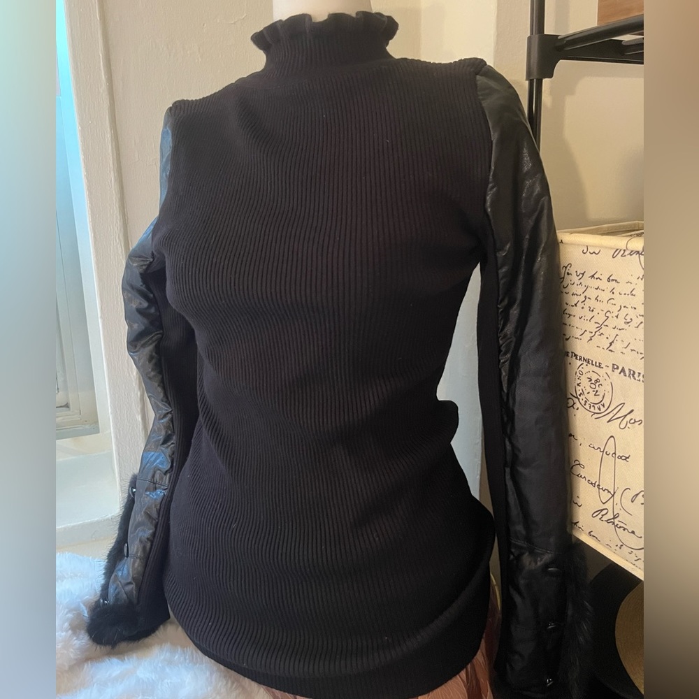 Woman’s black mixed material sweater. Like new. Small.